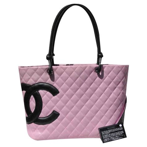 chanel purses pink and black.